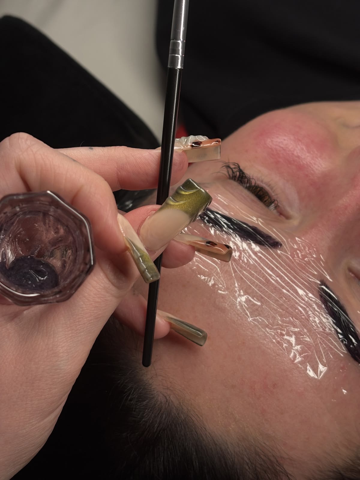 Precision brow treatment in progress